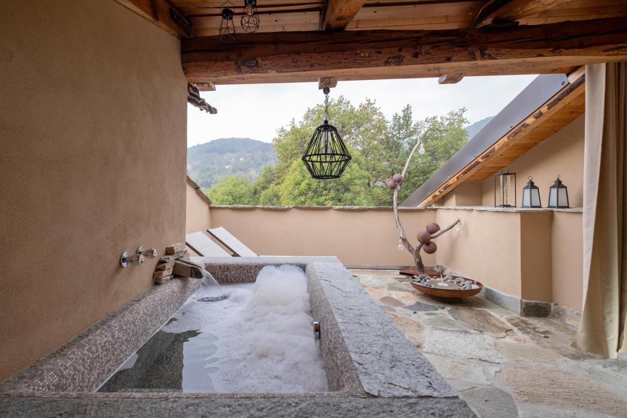 La Terrazza Naturas Con Romantica Mini Piscina Calda Sui Tetti Rossana Kültér fotó